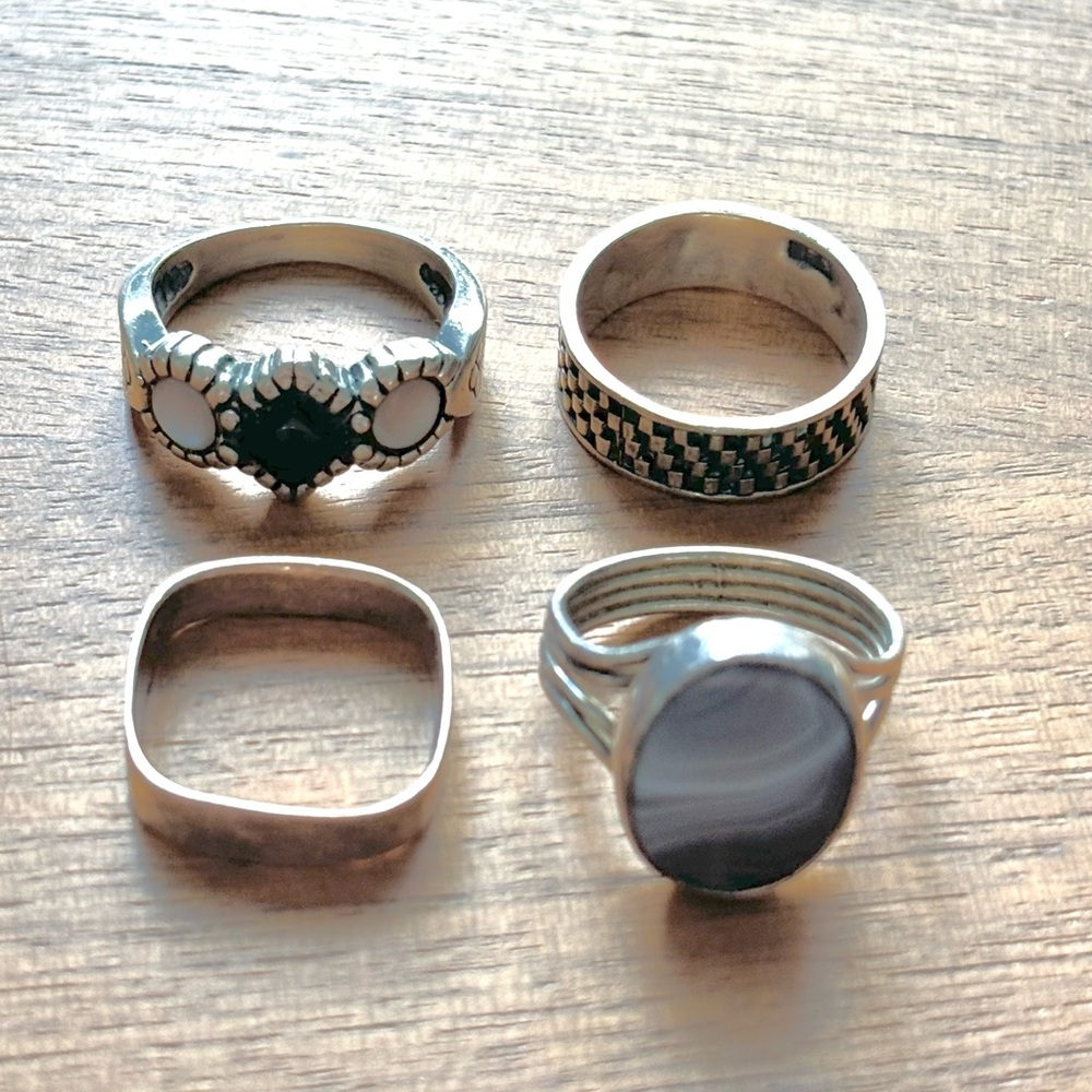 Four Sterling Silver Rings